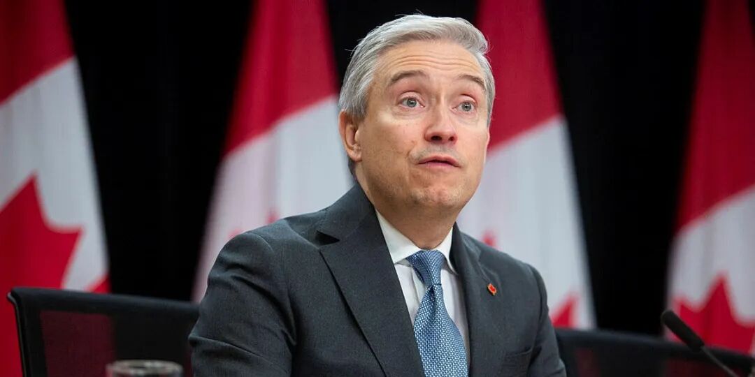 加拿大财长访华:在中美博弈中寻求“第三条路”